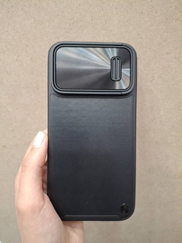 کاور گوشی موبایل آیفون 14 پرومکس iPhone14Promax چرمی Nillkin Camshield Leather با محافظ لنز کشویی رنگ مشکی