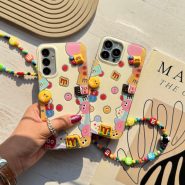 کاور گوشی موبایل آیفون 16 نرمال iPhone16- طرح سرزمین ام اند امز m&m's Land طرح برجسته و آویزدار - فون چارم