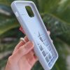 کاور گوشی موبایل آیفون 6، 7، 8، SE اس ای iPhone6- iPhone7- iPhone8- iPhoneSE طرح رود rhode رنگ طوسی Gray همراه با لیپ گلاس Lip Gloss رژلب رنگ رندوم