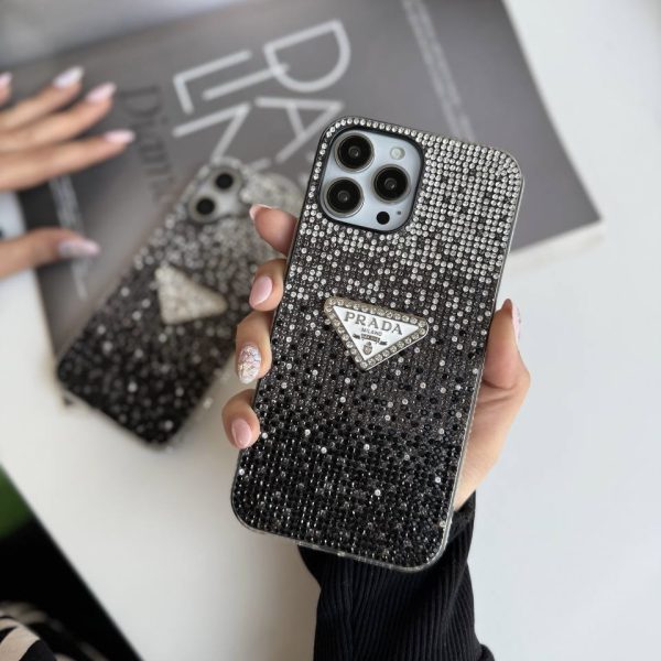 کاور گوشی موبایل آیفون 12نرمال و 12 پرو iPhone12- iPhone12Pro- طرح پرادا Prada نگین دار مشکی و نقره ای