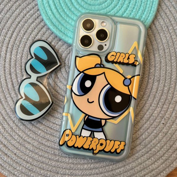کاور دختران نیرومند - پاور پاف گرلز Power Puff Girls رنگ آبی با پاپ سوکت عینکی و برگه هولوگرامی مناسب برای گوشی موبایل آیفون 12 نرمال و 12 پرو iPhone12- iPhone12Pro-