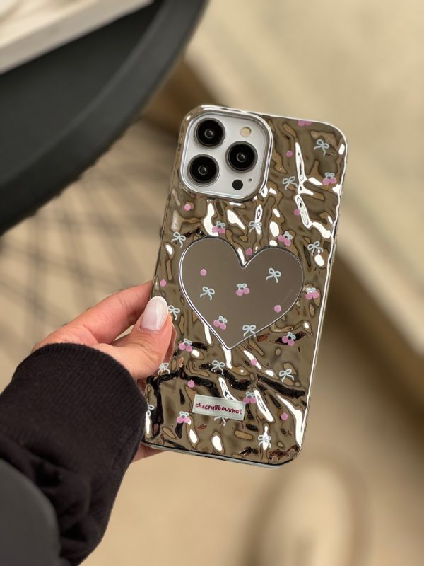 کاور گوشی موبایل آیفون 12 نرمال و 12 پرو iPhone12- iPhone12Pro- طرح قلبی کرومی نقره ای آینه ای گیلاس و پاپیون
