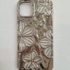 کاور گوشی موبایل آیفون 15 پرومکس iPhone15Promax طرح گل بهاری کرومی نقره ای با برگه رنگی