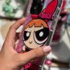 کاور دختران نیرومند - پاور پاف گرلز Power Puff Girls رنگ صورتی با پاپ سوکت عینکی و برگه هولوگرامی مناسب برای گوشی موبایل آیفون 13 پرومکس iPhone13Promax
